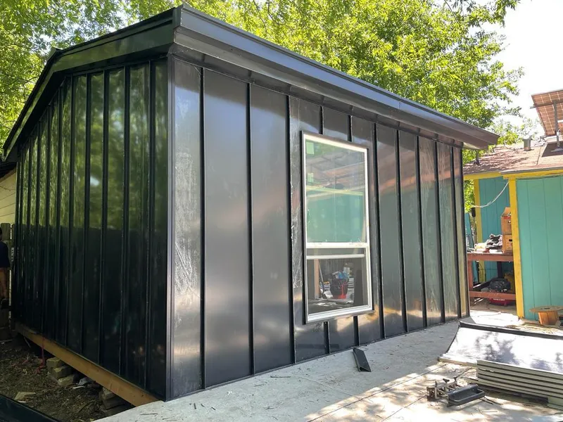 Black standing seam metal wall panels for Roof Inspection in Forest Hill