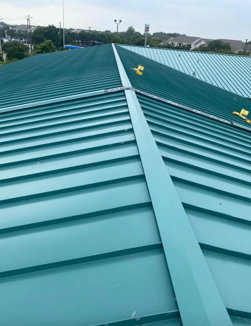 Green commercial metal roof ridge and valley for Metal Roof Repair in Forest Hill